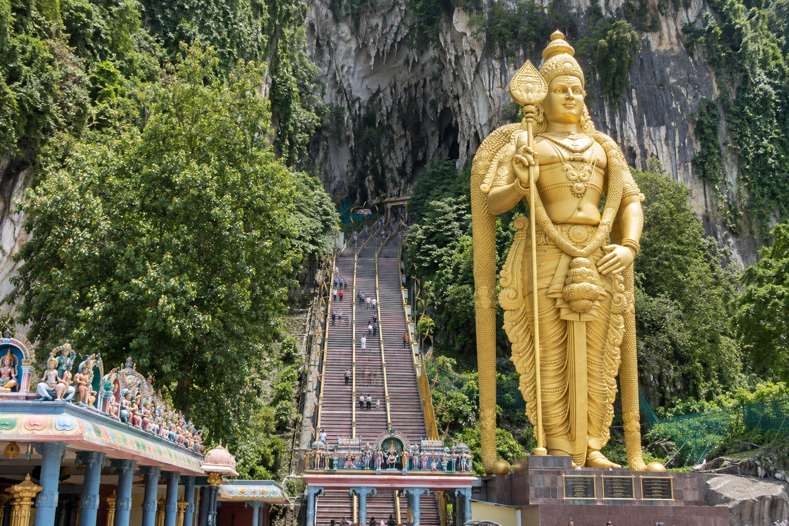 Illustrative catalog artwork of the golden Lord Murugan statue and 272 steps at Batu Caves